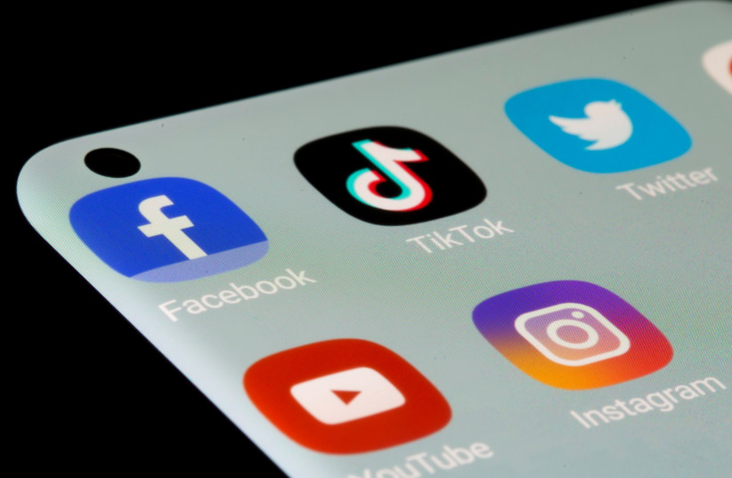 Facebook, TikTok, Twitter, YouTube and Instagram apps are seen on a smartphone in this illustration taken, July 13, 2021