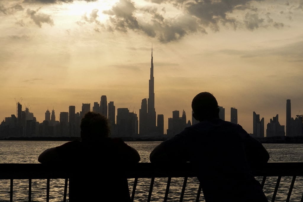 Sunset over Dubai. Daily passenger flights to Dubai will be postponed until October 25. Photo: Reuters