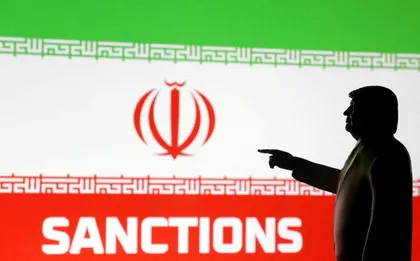 A 3D-printed miniature model depicting U.S. President Donald Trump, the Iranian flag and the word "Sanctions" in this illustration created in April 2025. Credit: Dado Ruvic/ REUTERS A 3D-printed miniature model depicting U.S. President Donald Trump, the Iranian flag and the word "Sanctions" in this illustration created in April 2025.