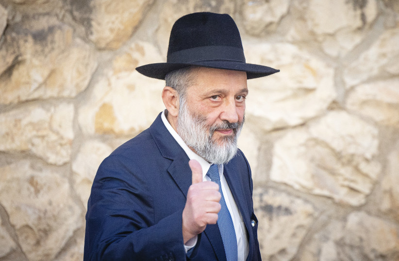 ARYE DERI gives the thumbs-up sign on Wednesday outside his Har Nof home in Jerusalem.