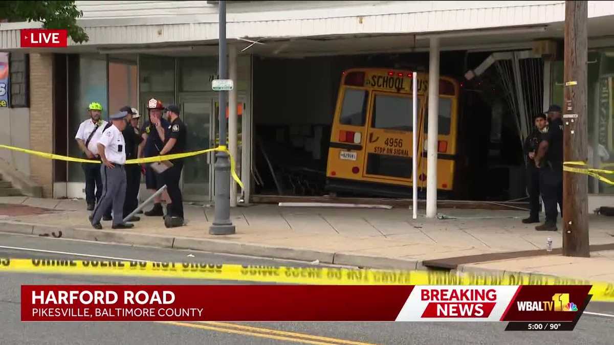 School bus crashes into Parkville building, 3 taken to hospitals