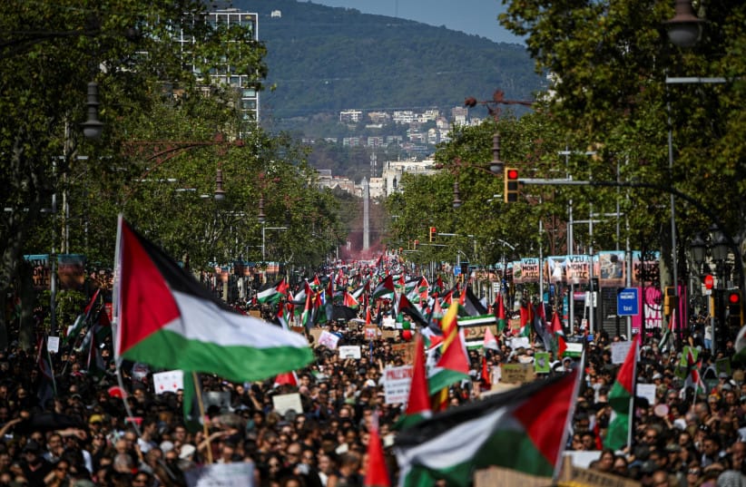 People march during a pro-Palestinian protest in Barcelona, Spain, October 4, 2025