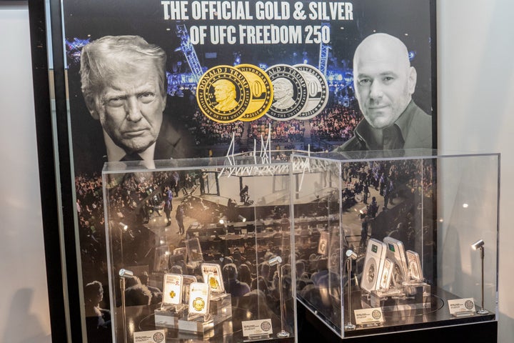 Commemorative silver and gold “Donald Trump” coins for sale at a pop-up shop ahead of the UFC Freedom250 fight on the South Lawn of the White House in Washington, D.C., on Sunday, June 14, 2026.