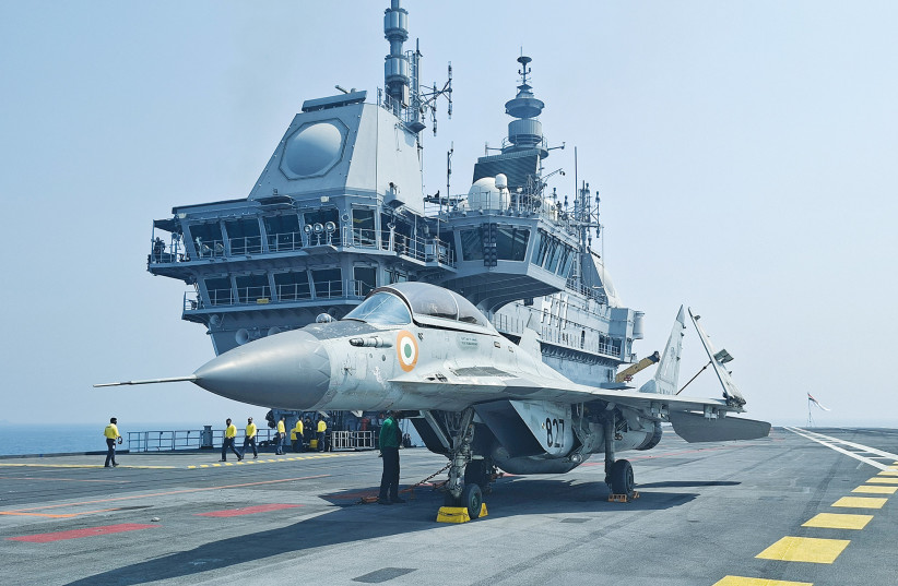 A MIG-29K fighter jet sits on the flight deck of India’s aircraft carrier ‘INS Vikrant’ during the International Fleet Review 2026 off the coast of Visakhapatnam, India.