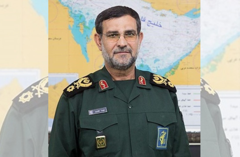 IRGC Navy chief Alireza Tangsiri stands in front of a map depicting the Strait of Hormuz, pictured in 2020; illustrative.
