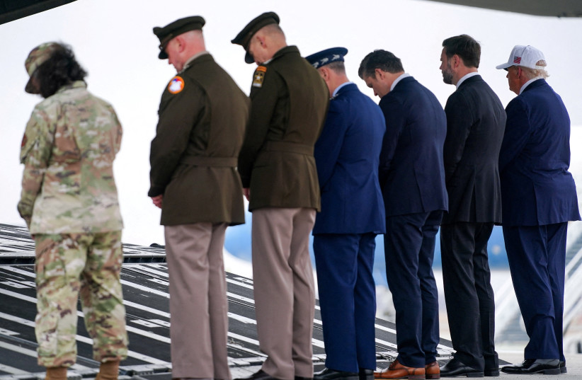 US President Donald Trump, Vice President JD Vance, Defense Secretary Pete Hegseth, and military officials participate in a dignified transfer of the remains of six US Army service members of the 103rd Sustainment Command who were killed in Kuwait, March 7, 2026.