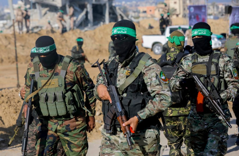 Hamas terrorists gather during a public event in Khan Younis, Gaza, on February 1, 2025.