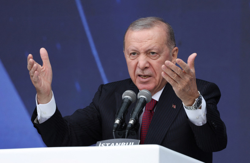 Turkish President Tayyip Erdogan speaks during a ceremony for the handover of new vehicles to the gendarmerie and police forces in Istanbul, Turkey, November 28, 2025.
