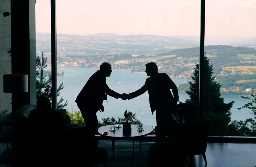 [FILE PHOTO] Delegation staff members meet during the quadrilateral meeting in Switzerland between the US, Iran, Pakistan, and Qatar on June 21, at the Lake Lucerne Summit, aimed at advancing a deal to end the Middle East conflict.