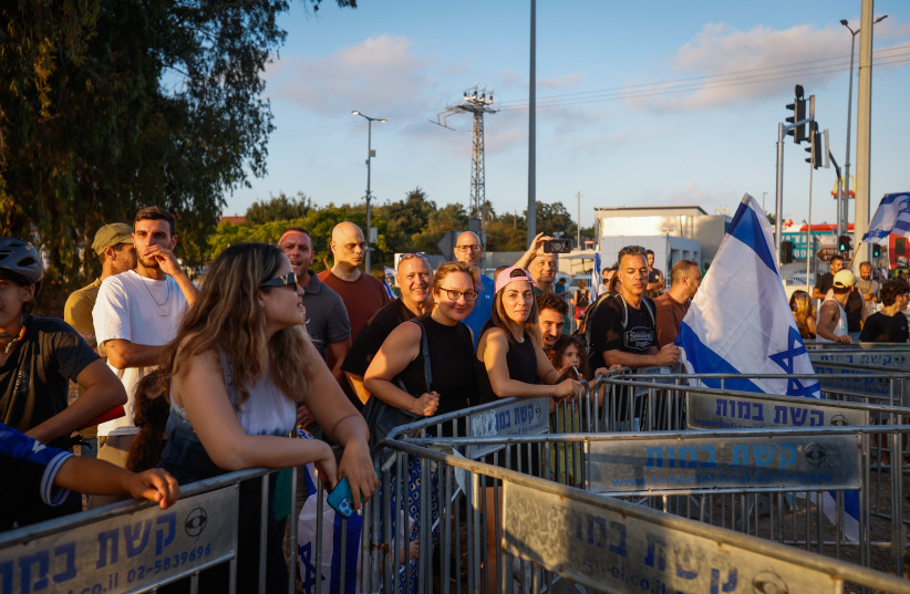 Residents of Kfar Yona protest against an ultra-Orthodox demonstration opposing the arrest of Haredi draft evaders near the Beit Lid military prison in central Israel, June 24, 2026.