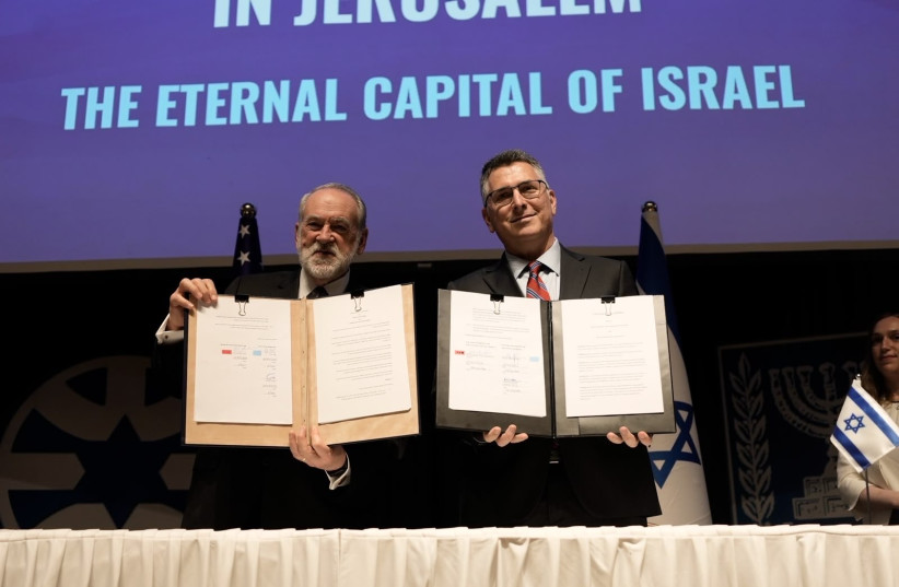 US AMBASSADOR to Israel Mike Huckabee and Foreign Affairs Minister Gideon Sa'ar sign an agreement allocating a site for the building of a US embassy in Jerusalem, July 1, 2026.