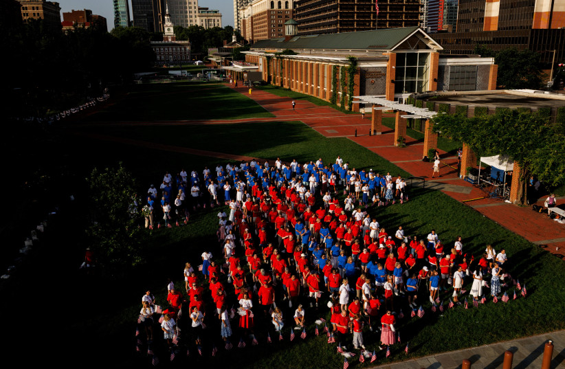 250 people pose while forming the ''Living Liberty Bell'' outlining the shape of the Liberty Bell on Independence Mall in Philadelphia, Pennsylvania, on July 2, 2026.