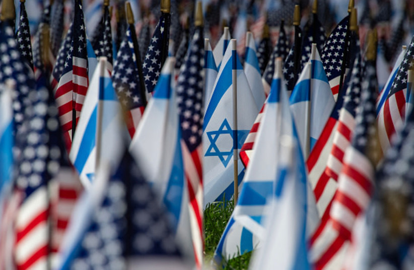 US and Israeli flags fill the field at Statler Park in Boston, Massachusetts, on October 18, 2023