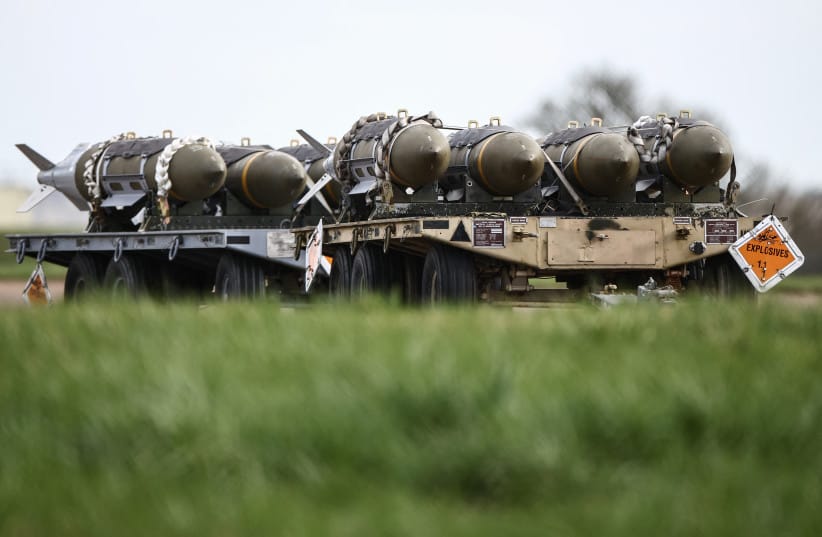 Joint Direct Attack Munitions (JDAM) are pictured on carts on the tarmac at RAF Fairford in south-west England on March 11, 2026; Illustrative.