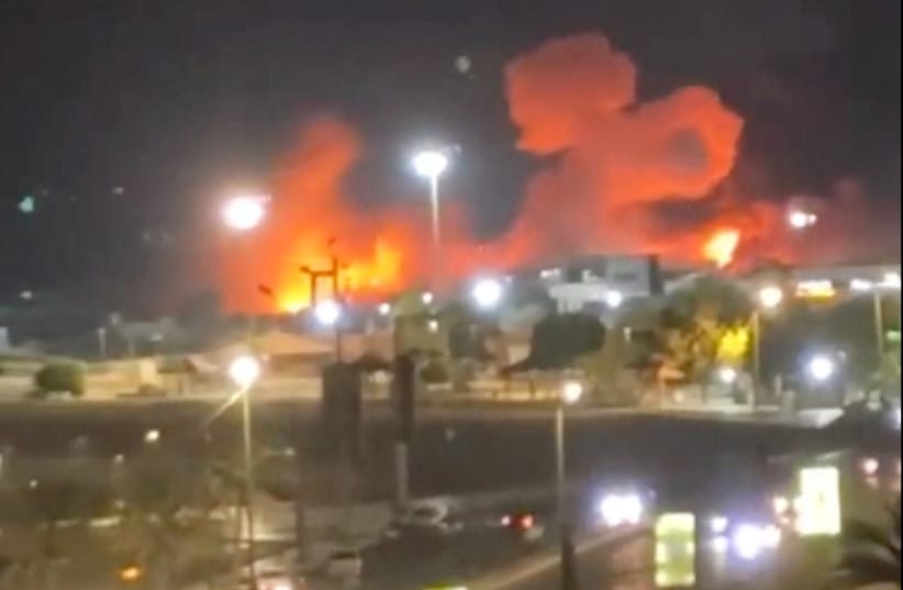 Smoke and flames rise after an explosion in Bandar Abbas, Hormozgan Province, Iran, in this screengrab obtained from a social media video released on July 8, 2026.