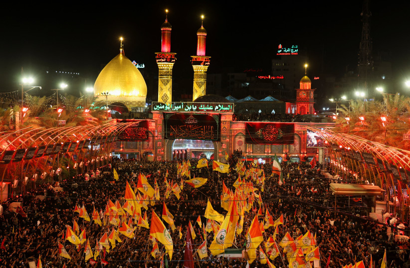 People attend a funeral procession for Iran's late Supreme Leader Ayatollah Ali Khamenei, who was killed on February 28 in Israeli and U.S. airstrikes, in Karbala, Iraq, July 9, 2026.