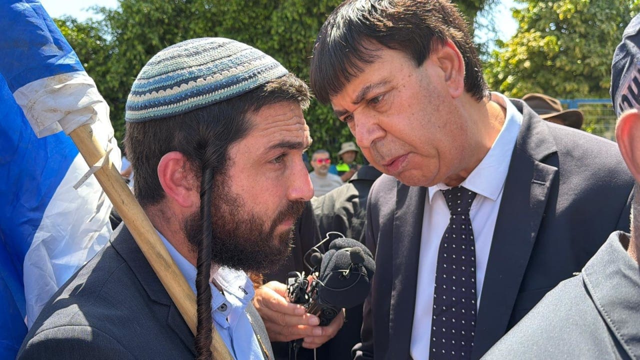 MK Zvi Sukkot visiting the city of Rahat as residents protest his visit, July 12, 2026.