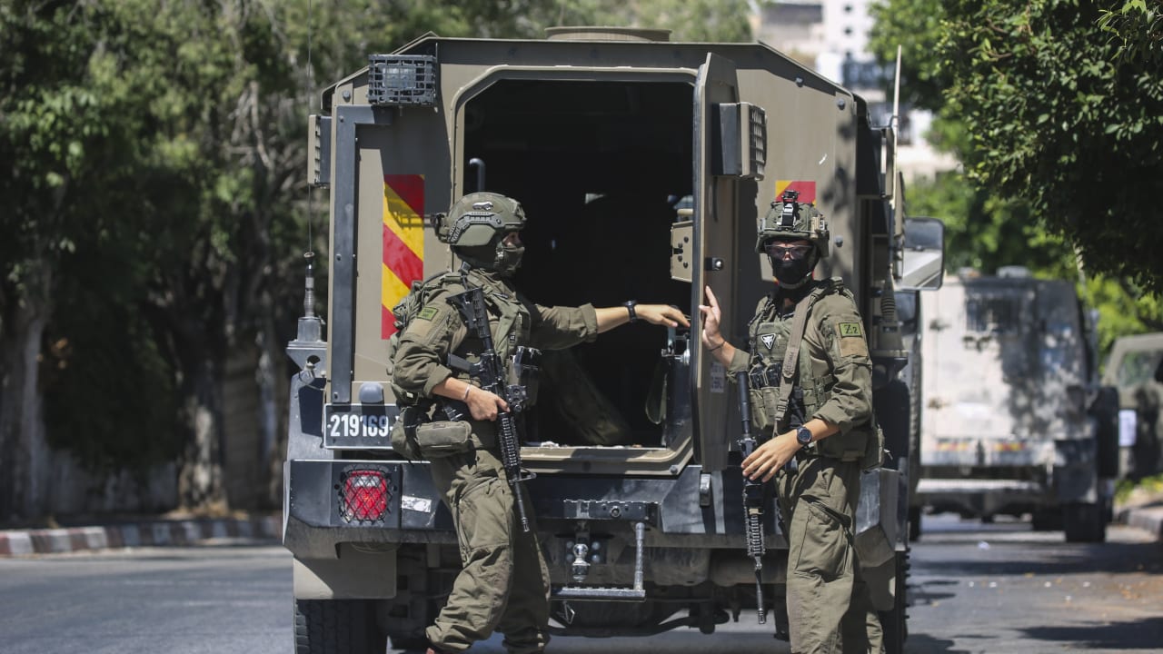 Israeli security forces operate during a raid in the West Bank city of Nablus, July 12, 2026.