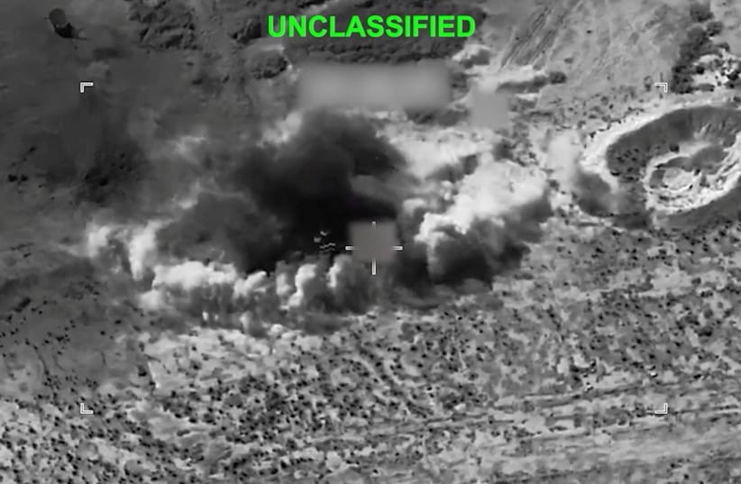 Smoke rises from an explosion at an unknown location, during what US Central Command (CENTCOM) says are strikes on Iran, in this screen grab taken from a handout video released on July 14, 2026.
