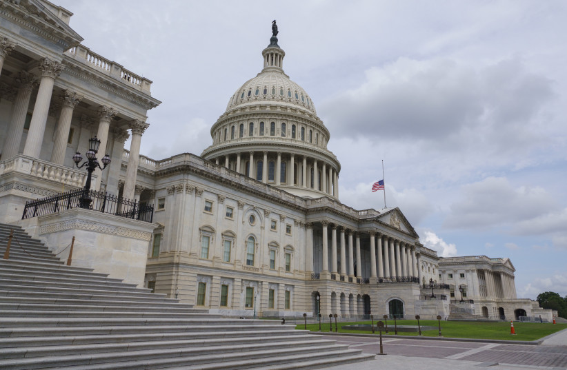 A flag flies at half-staff at the U.S. Capitol building following the death of Senator Lindsey Graham (R-SC) on July 12, 2026 in Washington, DC.