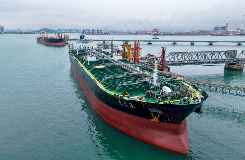 An Oil tanker named Yu fu Zuo unload imported crude oil at the crude oil terminal of in Qingdao port, in China's eastern Shandong province on July 16, 2026.