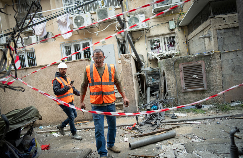 Israeli security and rescue forces at the scene where a missile fired from Iran toward Israel caused damage in Bnei Brak, April 1, 2026.