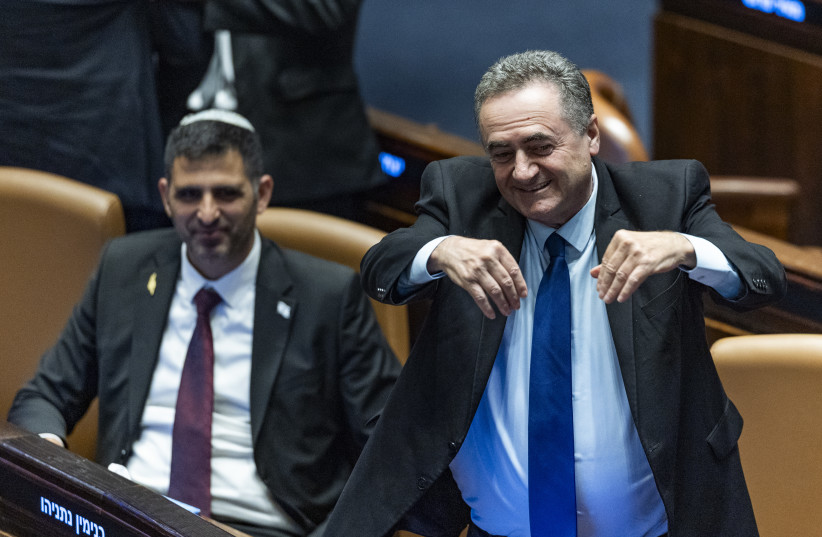 Defense Minister Israel Katz, government ministers and members of Knesset attend a plenum session and a vote on a bill to freeze arrests of haredi draft evaders at the assembly hall of the Knesset, the Israeli parliament in Jerusalem, July 14, 2026.