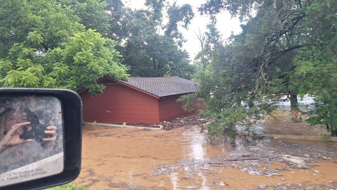 A flooded building in Lesterville, MO.