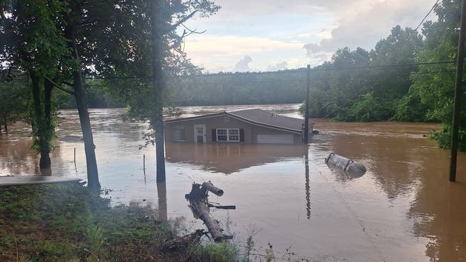 Home almost completely flooded in Lesterville, Missouri.