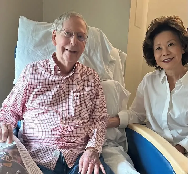Senator Mitch McConnell shared this image Sunday on his Facebook page, where he appears to be sitting in a hospital chair with his wife Elaine Chao.