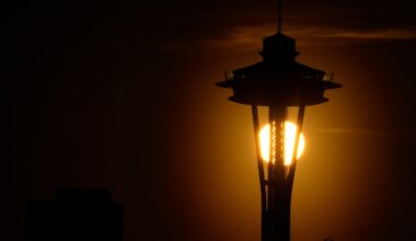 Police arrest 1 person and search for another after Seattle festival shooting that killed 3