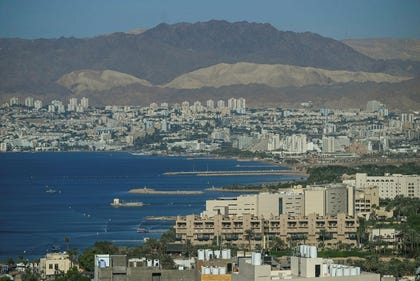 A view of the Gulf of Aqaba and the coastline of the Jordanian city of Aqaba, with Eilat in Israel visible across the water, is seen from Aqaba, Jordan, in 2025. Credit: STR via Reuters Connect A view of the Gulf of Aqaba and the coastline of the Jordanian city of Aqaba, with Eilat in Israel visible across the water, is seen from Aqaba, Jordan, in 2025.