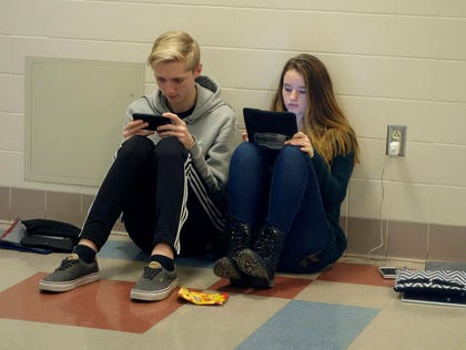 The Economist examined various explanations for the global decline in students' skill levels including teenagers' reliance on screens and computer games. Credit: Education Images / UIG via Getty Images The Economist examined various explanations for the global decline in students' skill levels including teenagers' reliance on screens and computer games.