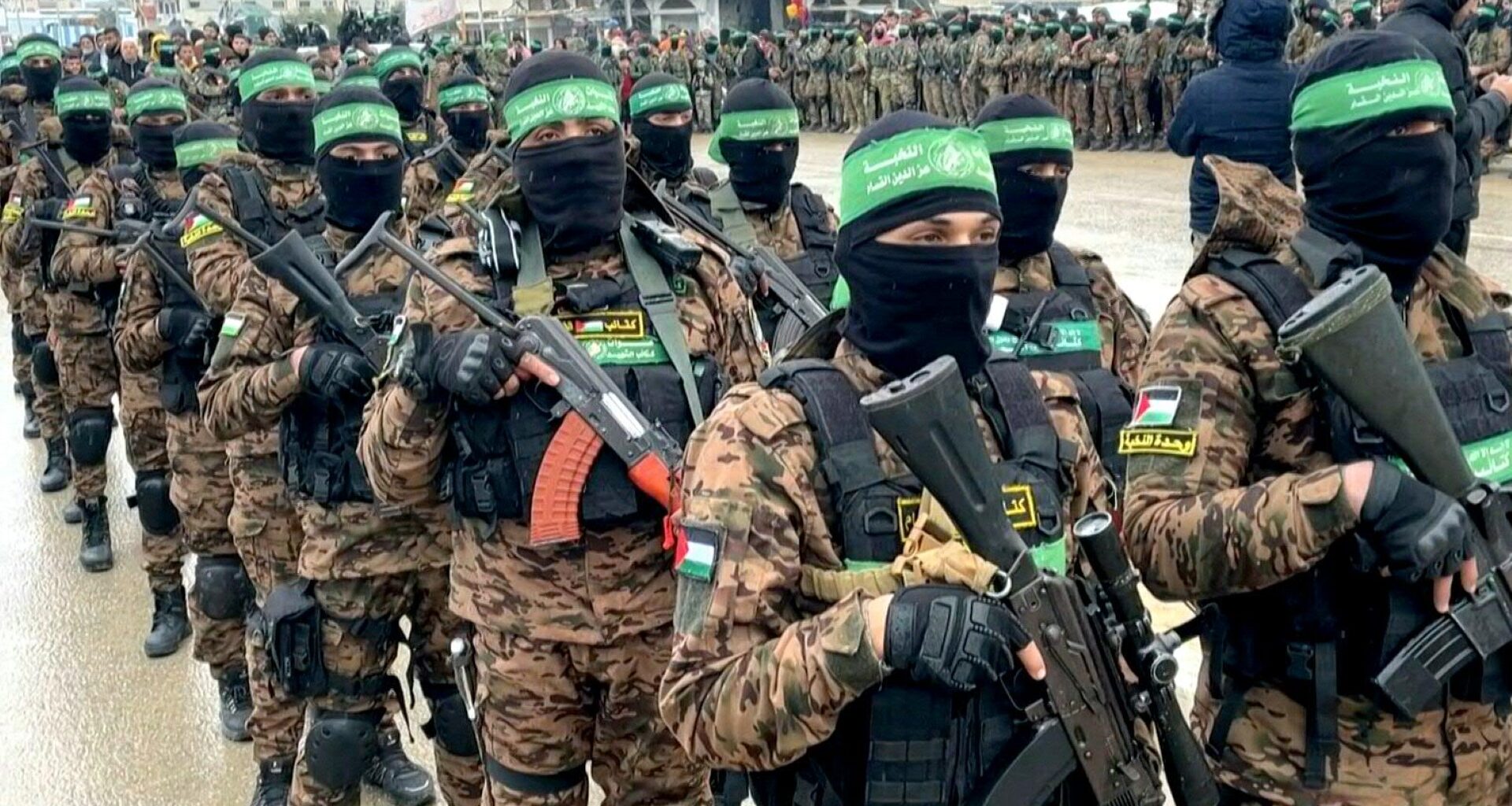 Members of Hamas's armed wing, the Ezzedine al-Qassam Brigades, take part in a formation in Khan Yunis, Gaza. Hamas says its agreement with Israel includes provisions on the group's weapons and a gradual withdrawal of Israeli forces from the Gaza Strip. Image: AFP TV