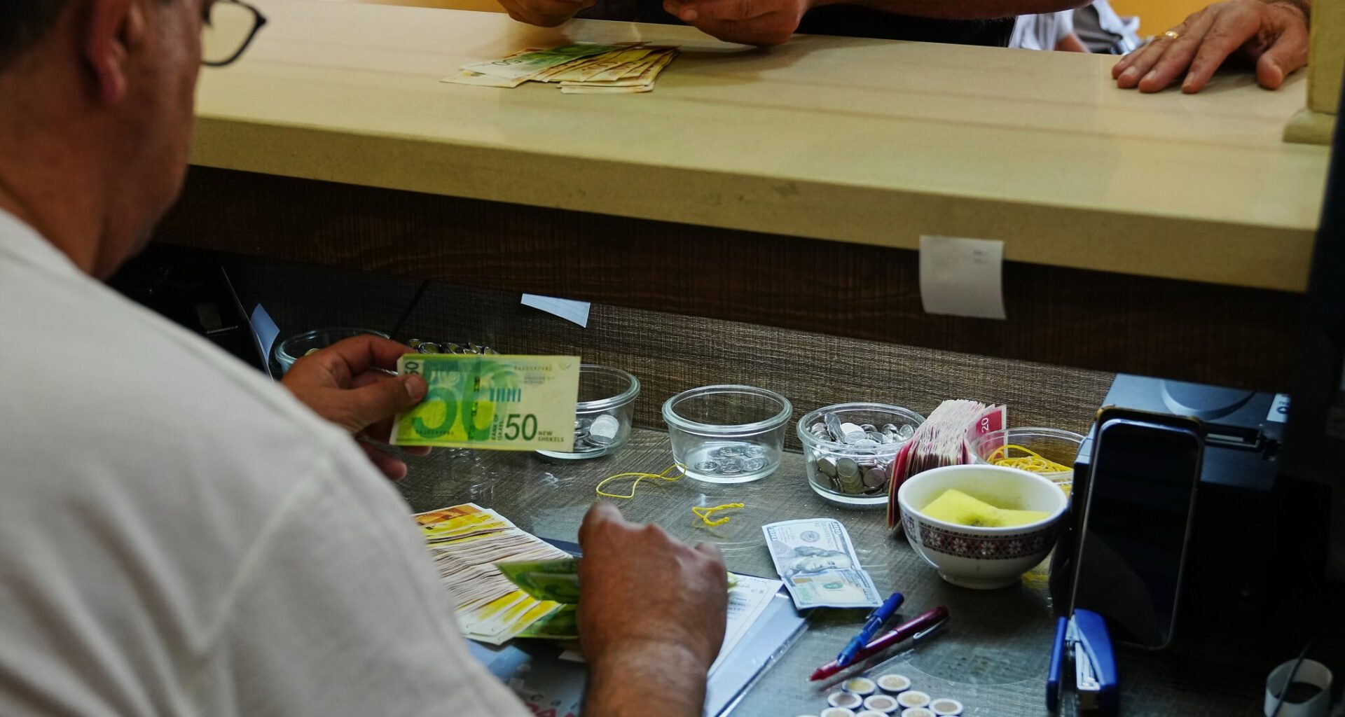 'Economic warfare?' In the West Bank, too much cash is breaking the Palestinian economy