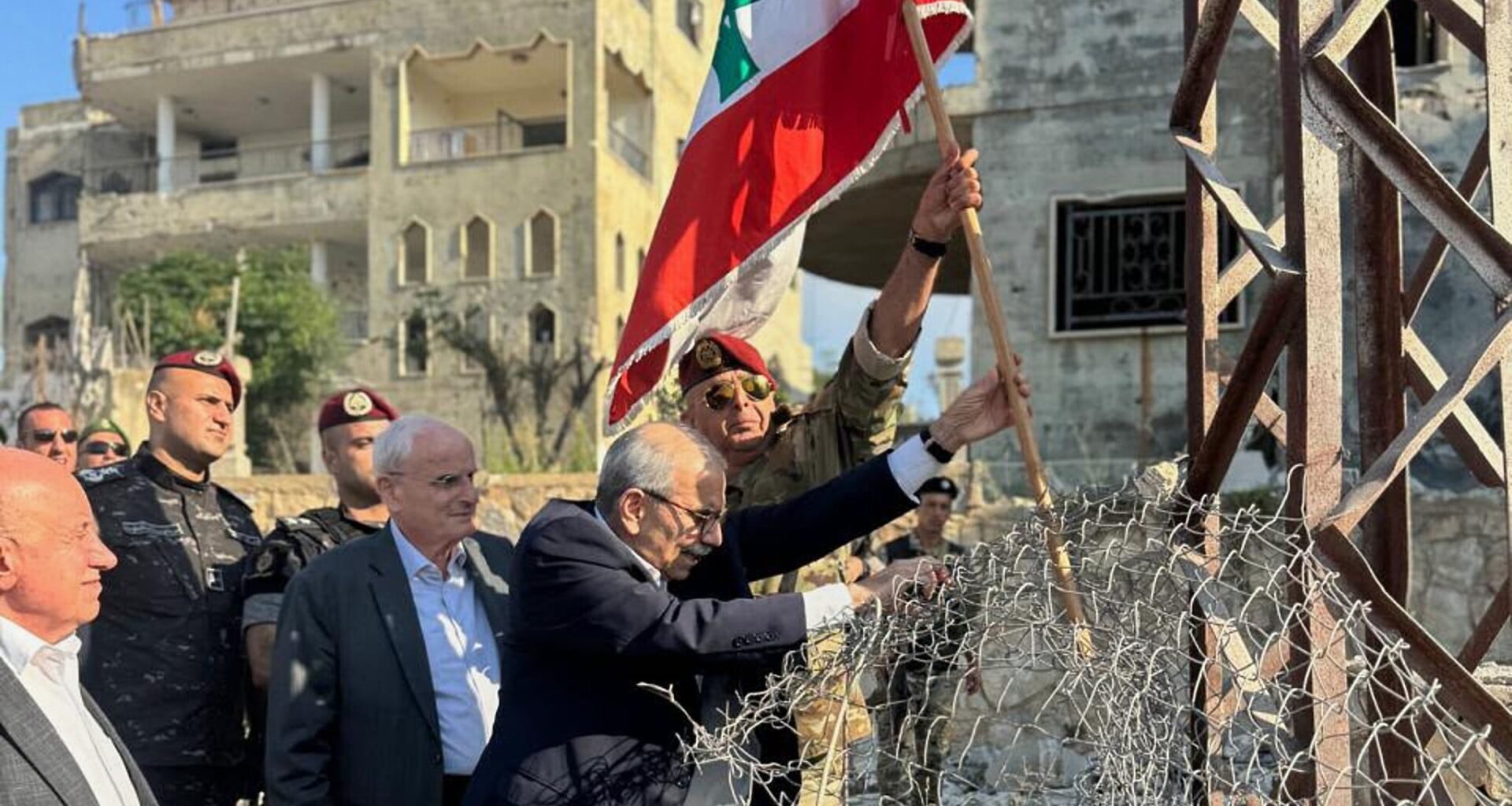Lebanese PM plants flag in southern village, hailing start of 'complete Israeli withdrawal'