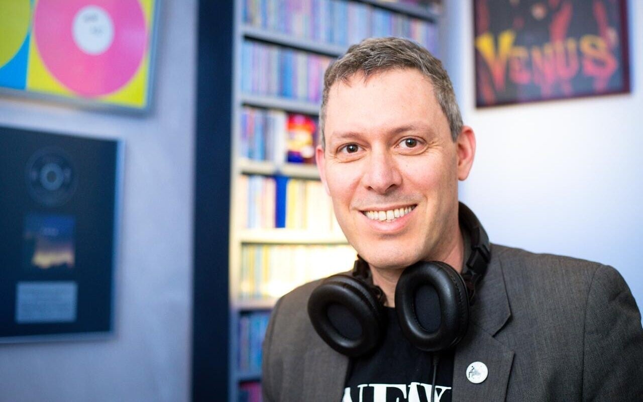 Avi Goldberger surrounded by music, May 2026 (Roy Elman)