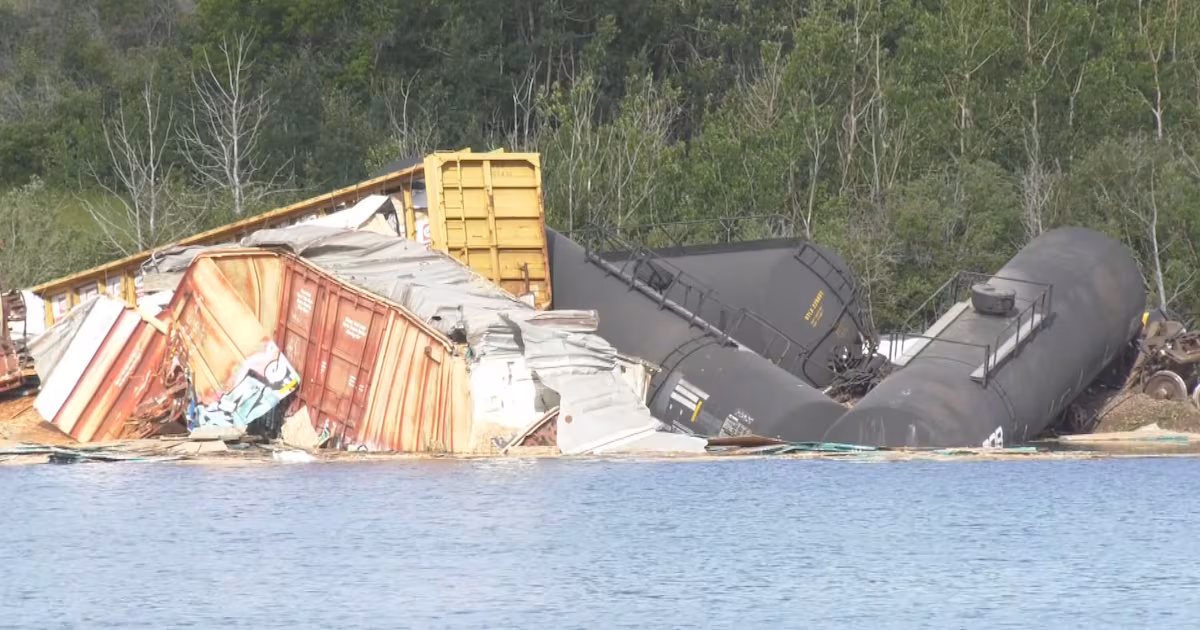 Derailment sends train cars into Calgary pond - CTV News