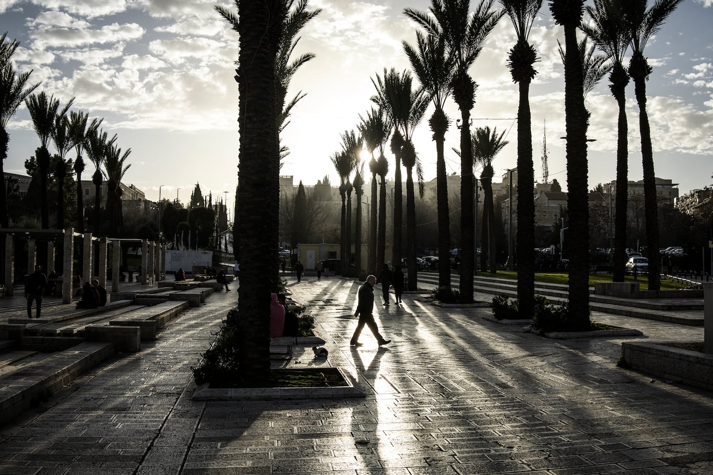A man walked through Mish'ol HaPninim Garden outside the old city of Jerusalem on Jan. 26.