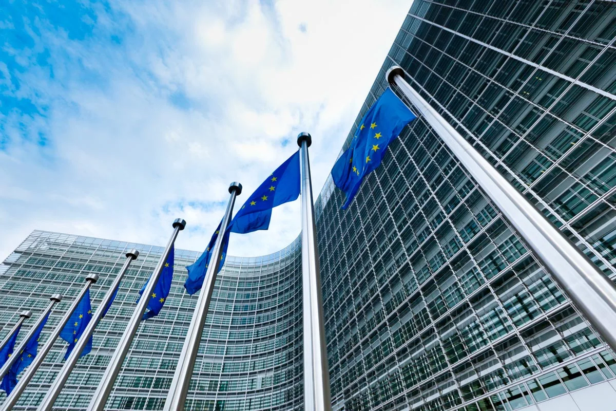 European Union blue and gold flags flying in Brussels