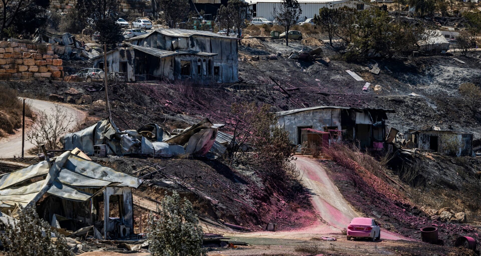 13 homes burnt, dozens damaged in West Bank settlement as crews battle blaze for 2nd day