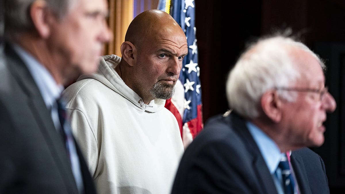 John Fetterman and Bernie Sanders speak in Senate