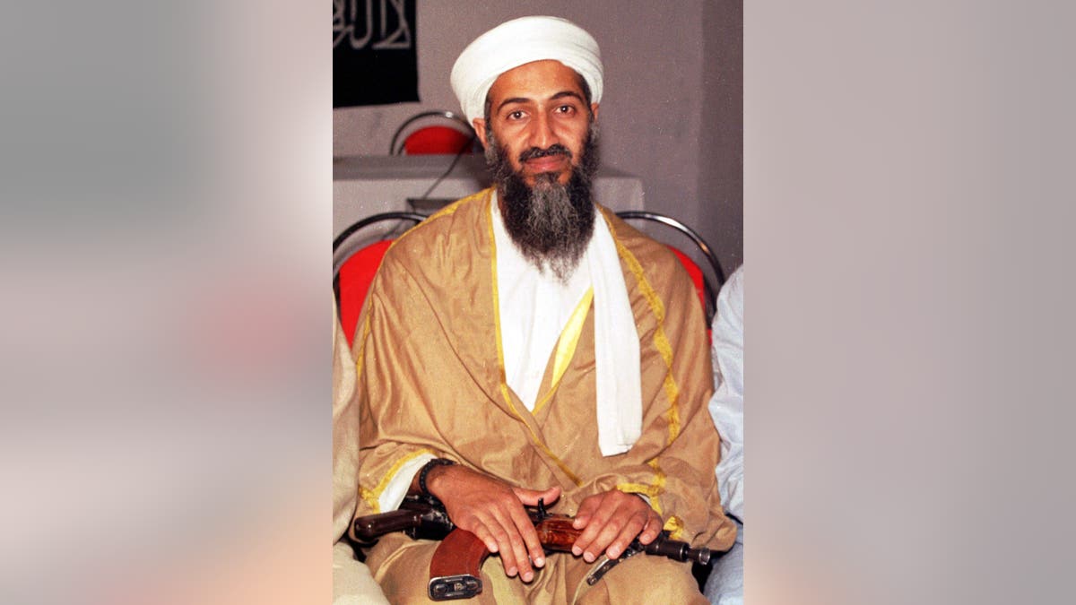 Osama bin-Laden sits in an undated photo.