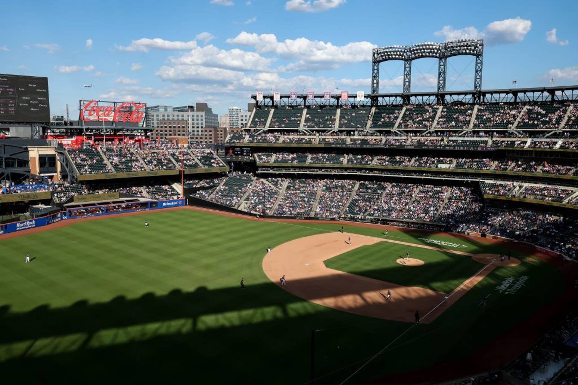 A wide shot of Citi Field is shown from June.