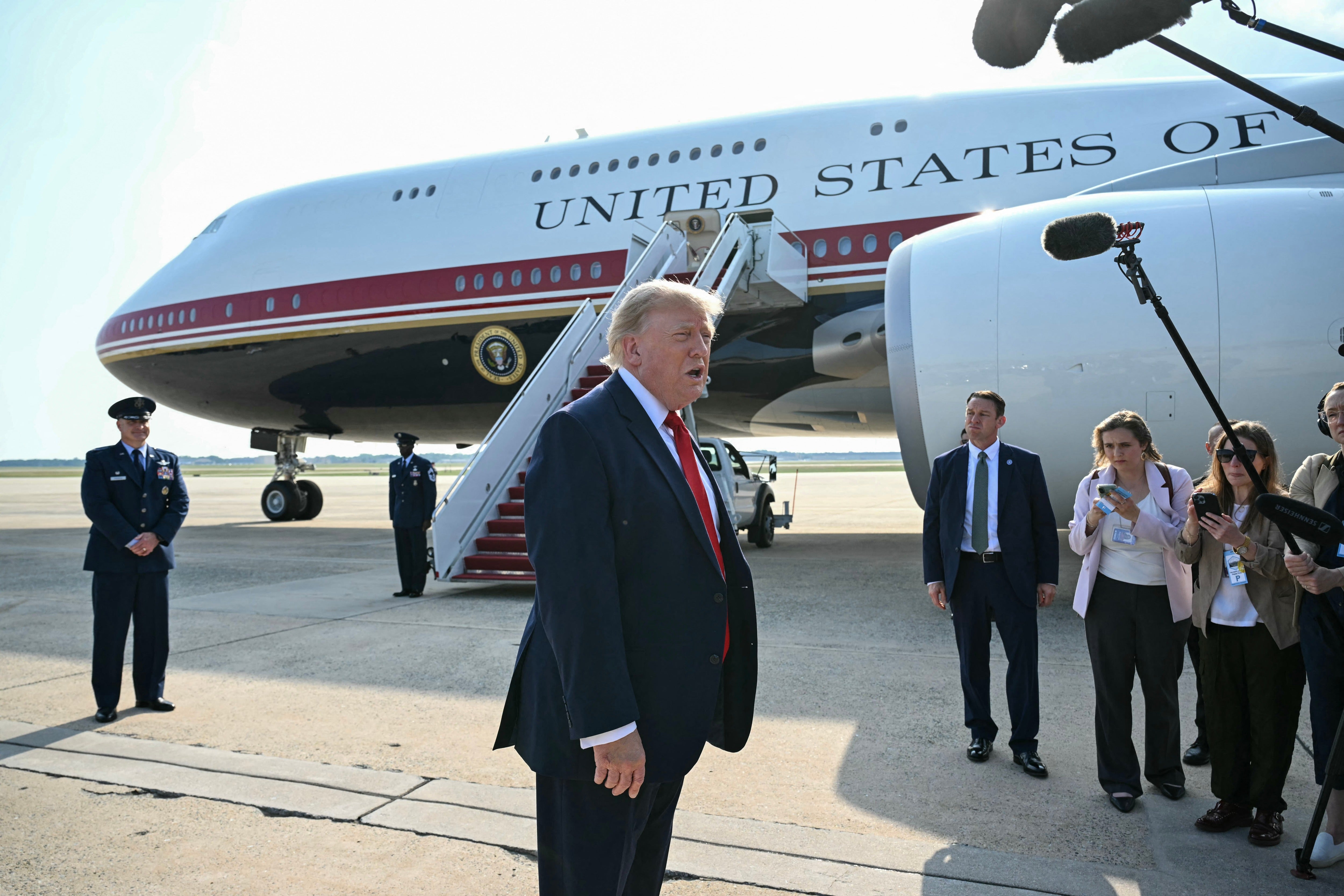 The Trump administration issued subpoenas to multiple New York Times journalists after the newspaper reported on security concerns related to the president's new Air Force One. Pictured: Trump speaks to the press before departing for his inaugural flight on the Qatari-gifted jet on July 1