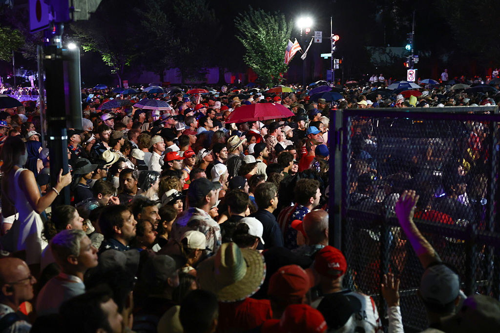 Visitors gather at the security barriers to re-enter the National Mall for the "Salute to America 250" Fourth of July celebrations