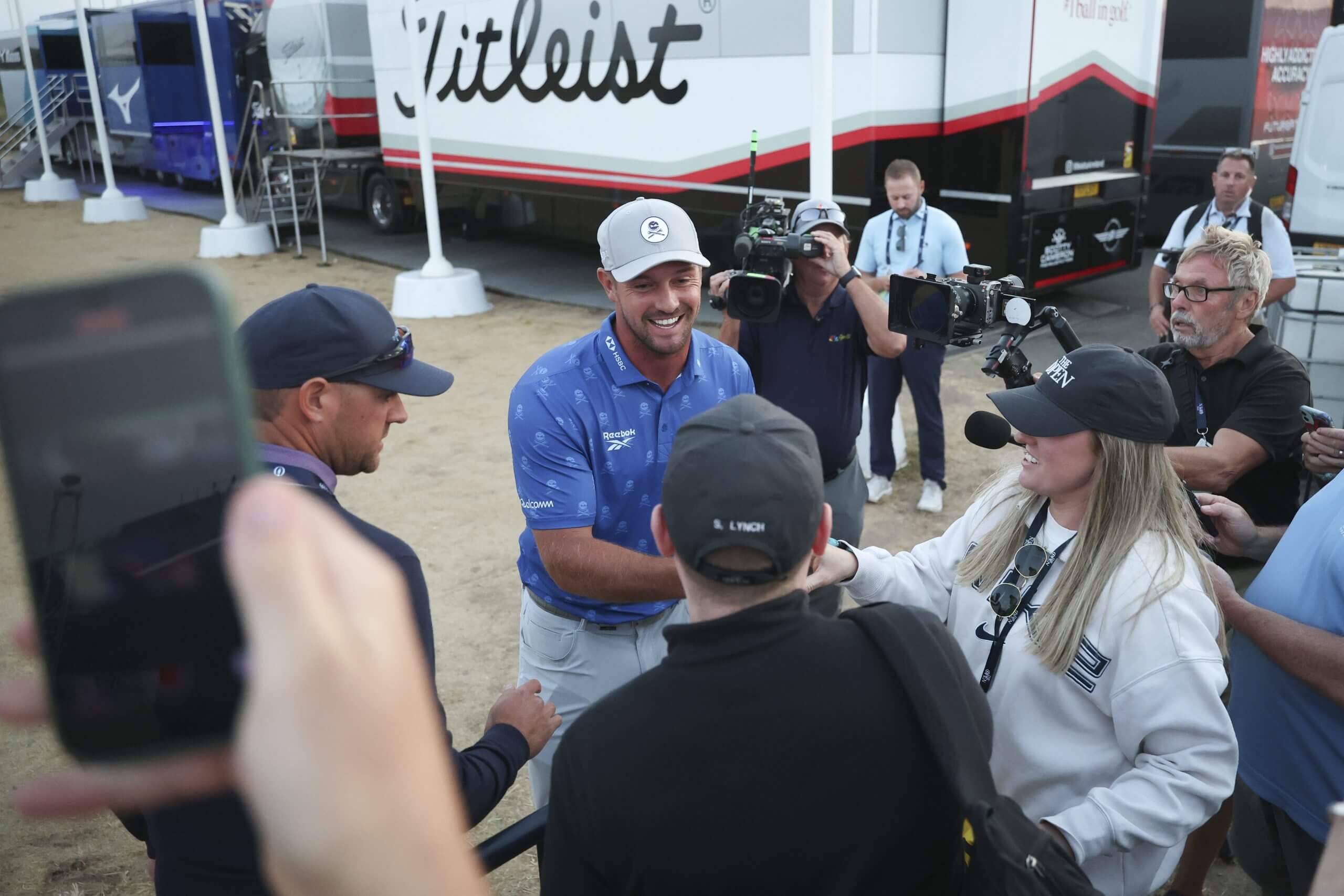 Bryson DeChambeau stopped to speak to fans and sign an autograph in the heat of the moment Friday.
