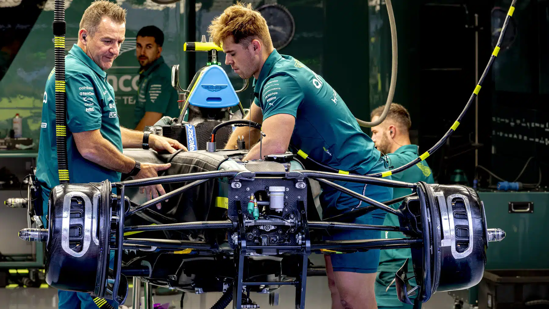 Mechanics work on the car of Formula 1 driver Fernando Alonso of the Aston Martin Aramco Formula 1 Team during the Formula 1 Hungary Grand Prix at the Hungaroring