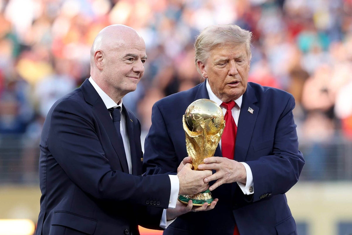 Trump booed by World Cup final crowd, takes part in trophy presentation
