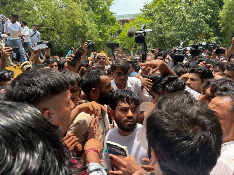 Dipke is surrounded by supporters during a protest at Jantar Mantar on June 6, 2026
